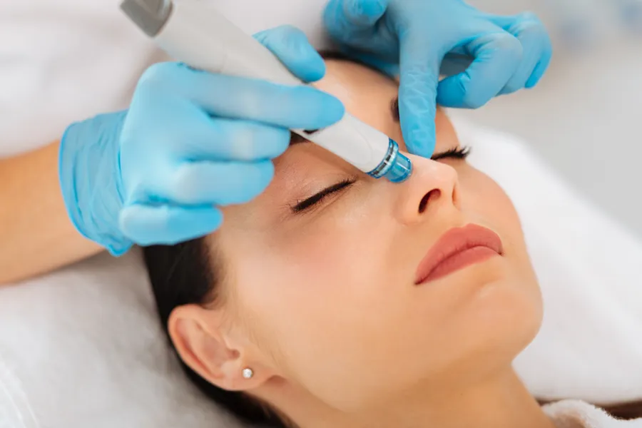 AquaFirmeFacial-Clinic Close up of a woman receiving AquaFirme Facial Treatment by Regenerative Medical Institute in Greenville.